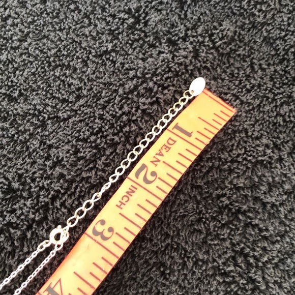 Heart bling dime size w/solid back with slight rub marks on back. Silver color. - Picture 8 of 15